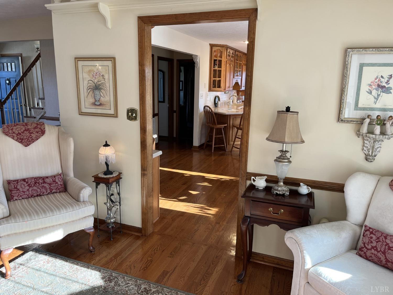 3912 Lowry Road Goode, VA 24556 - Photo 6 of 56 a living room with furniture and a flat screen tv