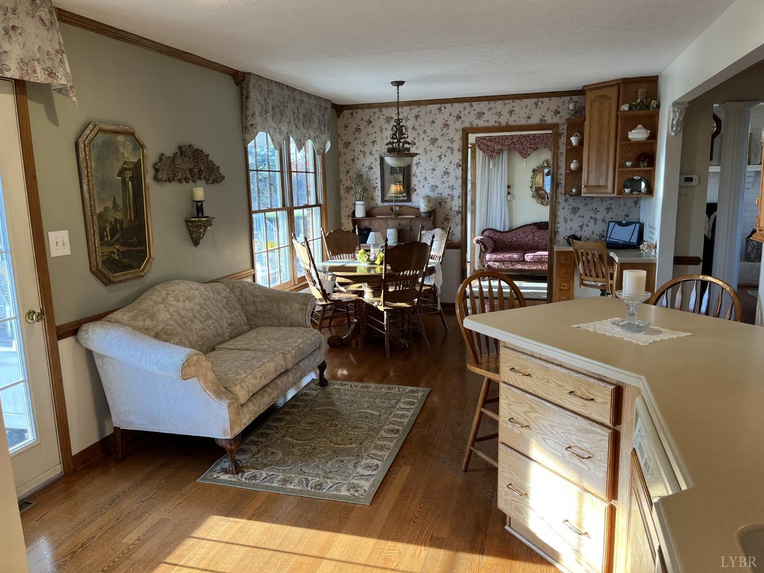 3912 Lowry Road Goode, VA 24556 - Photo 7 of 56 a living room with furniture and a large window
