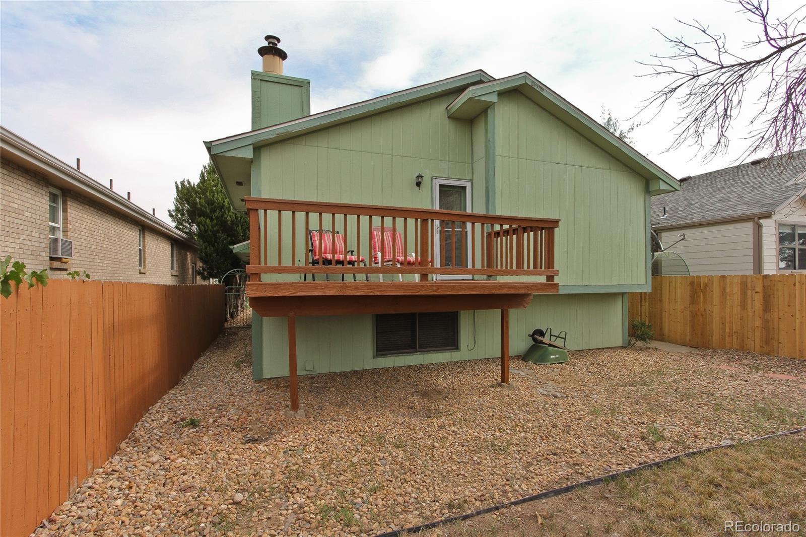 645 Wade Road Longmont, CO 80503 - Photo 32 of 32 a view of a house with wooden fence