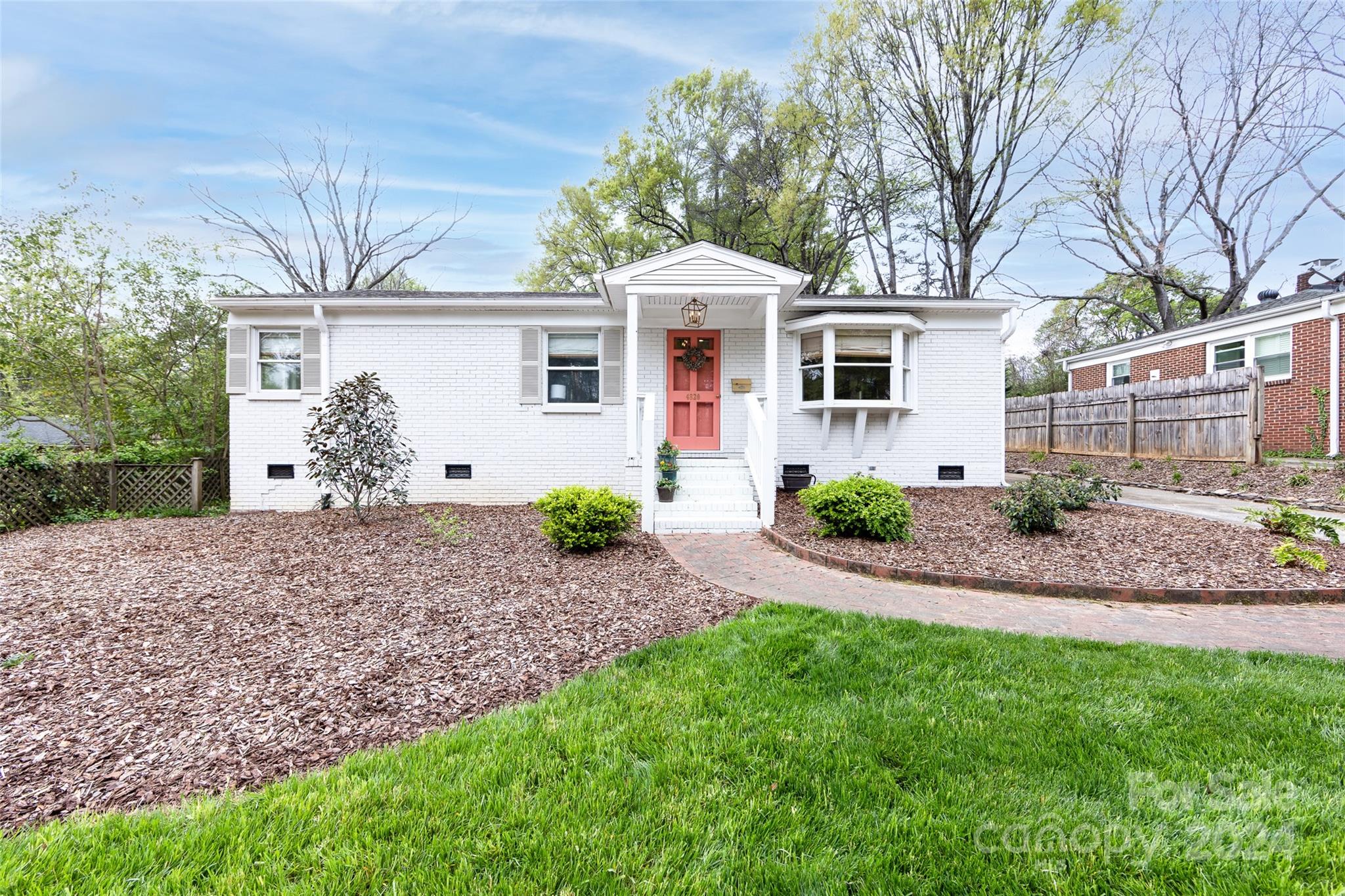 4820 Murrayhill Road Charlotte, NC 28209 - Photo 1 of 31 a view of a house with a yard and potted plants