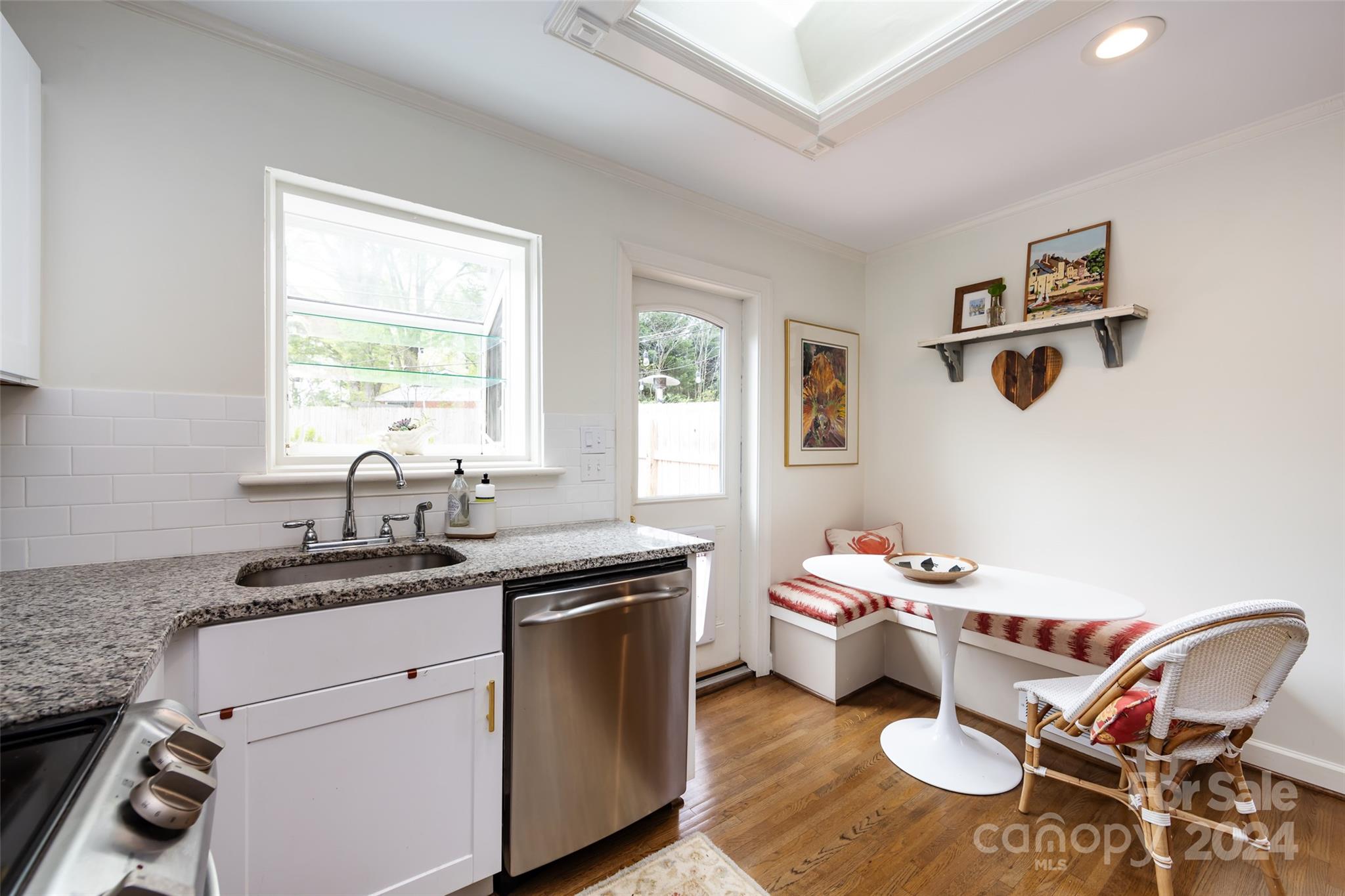 4820 Murrayhill Road Charlotte, NC 28209 - Photo 13 of 31 a kitchen with a sink and cabinets