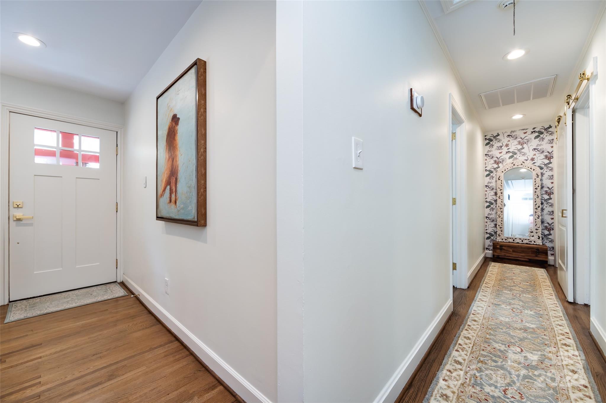 4820 Murrayhill Road Charlotte, NC 28209 - Photo 14 of 31 a view of a hallway with wooden floor and closet