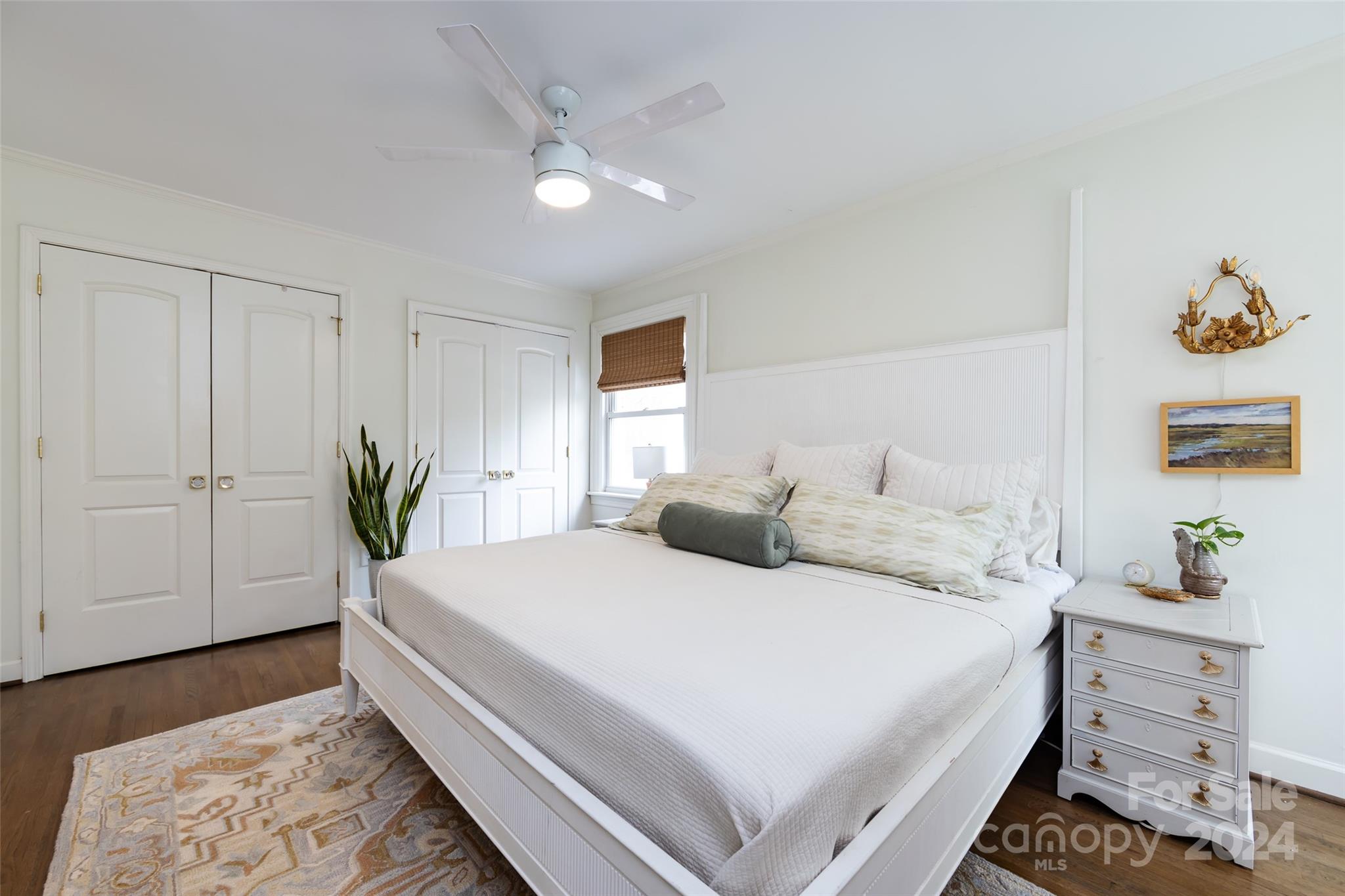 4820 Murrayhill Road Charlotte, NC 28209 - Photo 15 of 31 a bedroom with a bed and a potted plant