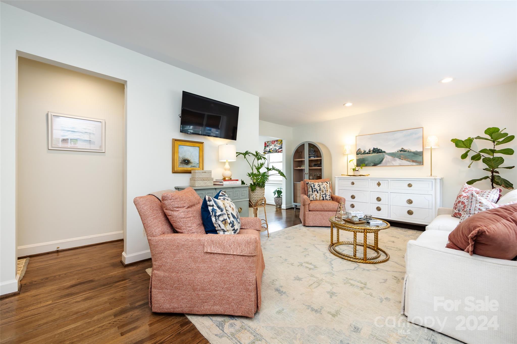 4820 Murrayhill Road Charlotte, NC 28209 - Photo 6 of 31 a living room with furniture and a flat screen tv