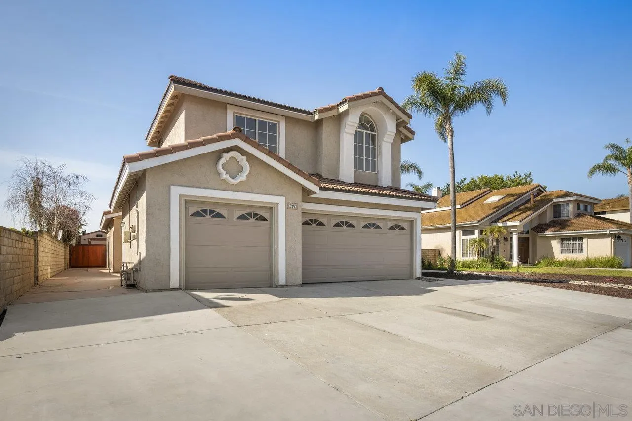 1363 Corte Alveo Oceanside, CA 92057 - Photo 3 of 62 a front view of a house with a yard