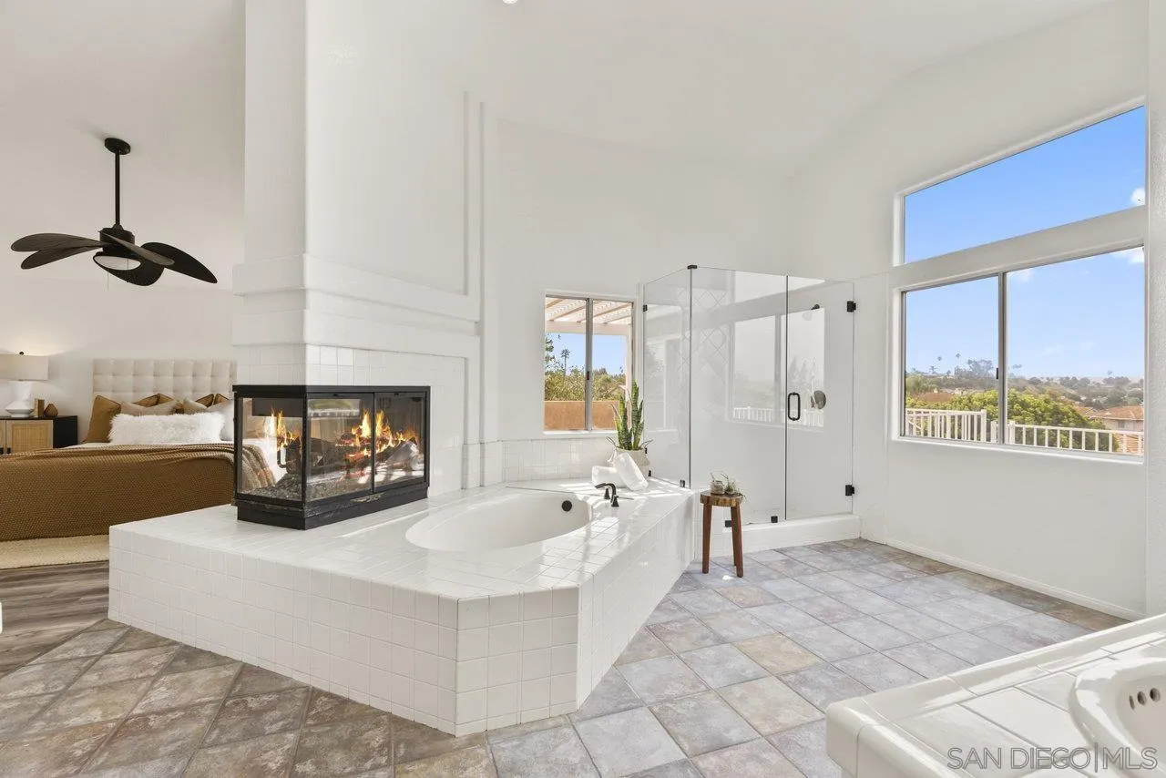 1363 Corte Alveo Oceanside, CA 92057 - Photo 35 of 62 a living room with furniture and a fireplace