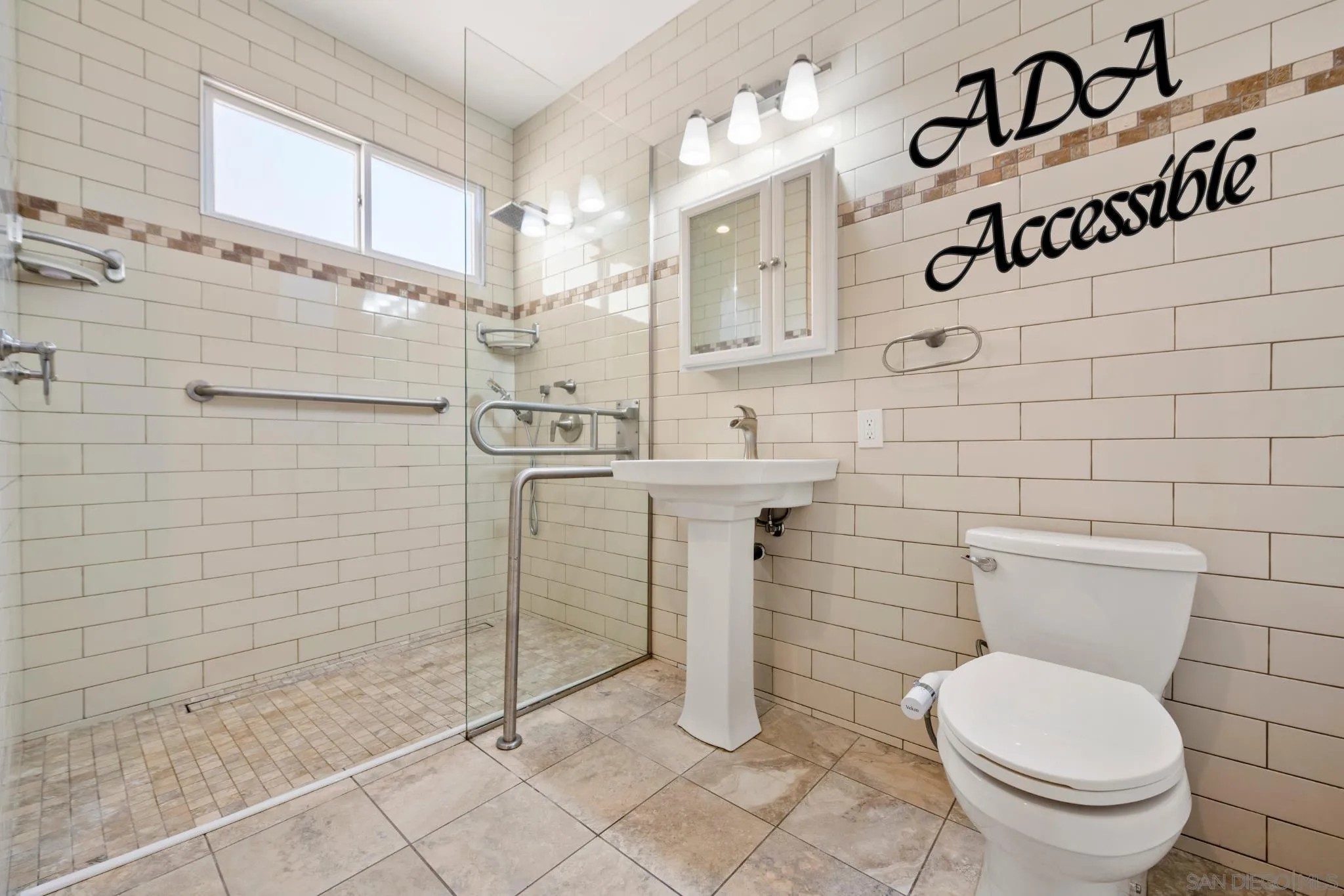 1363 Corte Alveo Oceanside, CA 92057 - Photo 47 of 62 a bathroom with a toilet sink and mirror