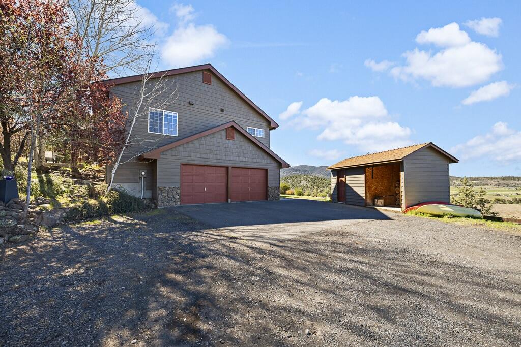 13351 Crystal Springs Road Klamath Falls, OR 97603 - Photo 6 of 51 a front view of a house with a yard
