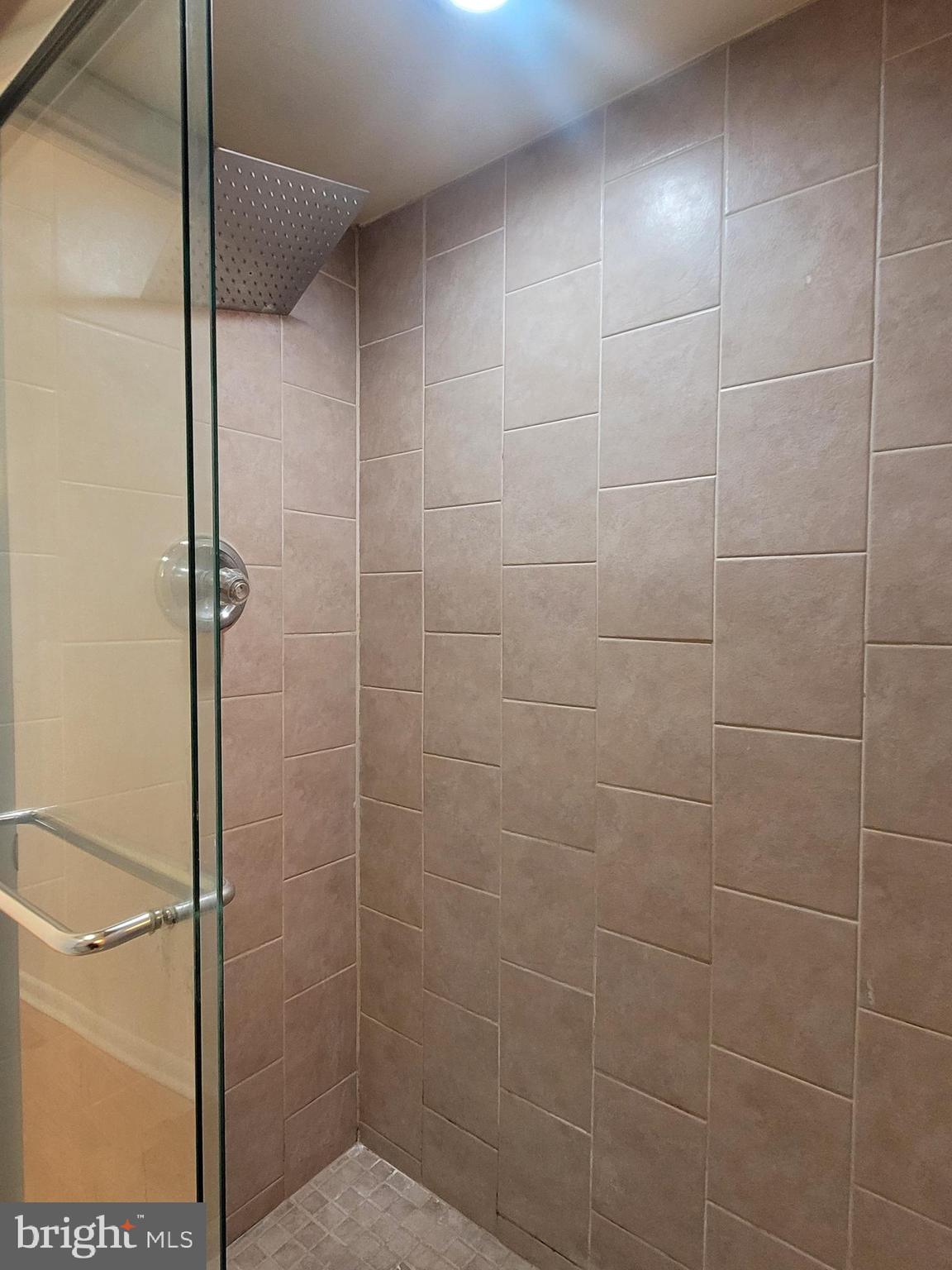 2015 Chestnut Street, Unit 2F Philadelphia, PA 19103 - Photo 15 of 16 a bathroom with a shower
