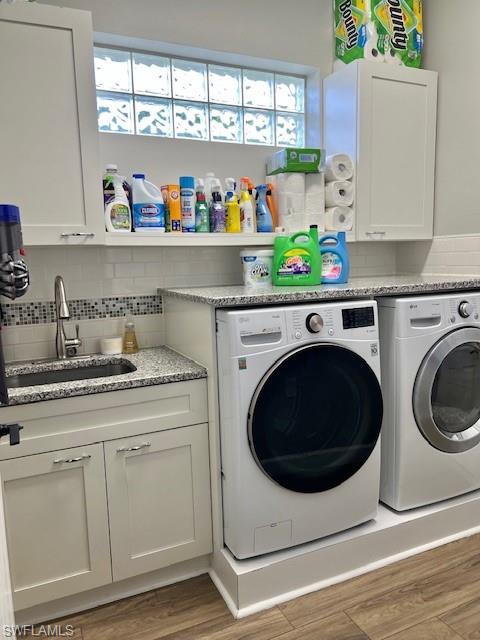3411 Sandpiper Way Naples, FL 34109 - Photo 24 of 35 a utility room with sink dryer and washer