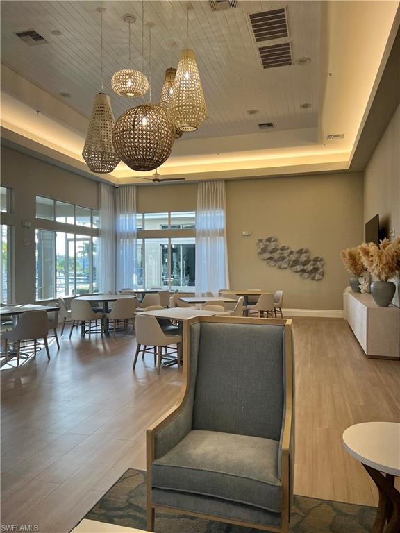 3411 Sandpiper Way Naples, FL 34109 - Photo 27 of 35 a living room with furniture and window