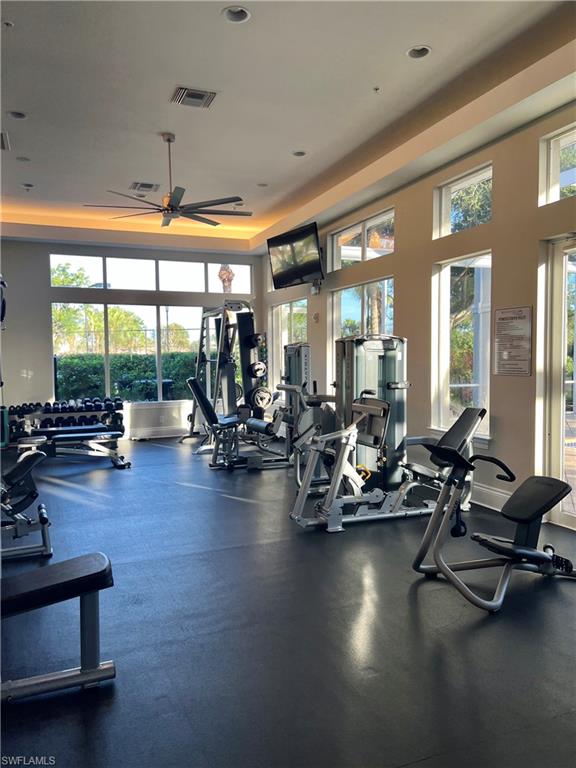 3411 Sandpiper Way Naples, FL 34109 - Photo 28 of 35 a view of a room with gym equipment