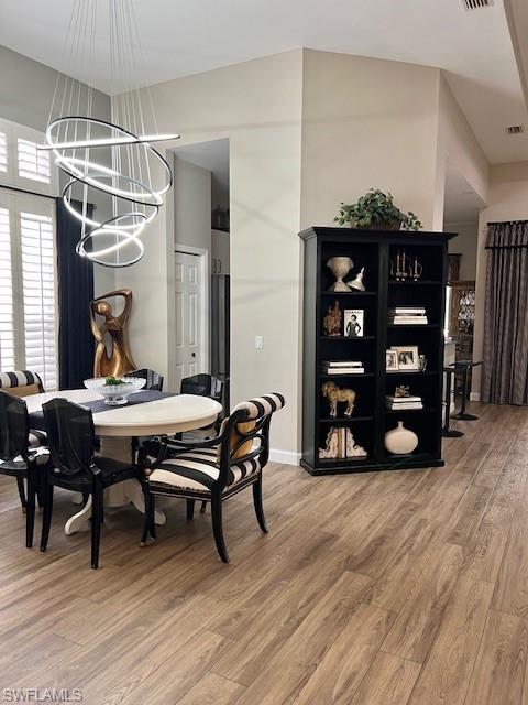 3411 Sandpiper Way Naples, FL 34109 - Photo 6 of 35 a view of a chairs and table in a room