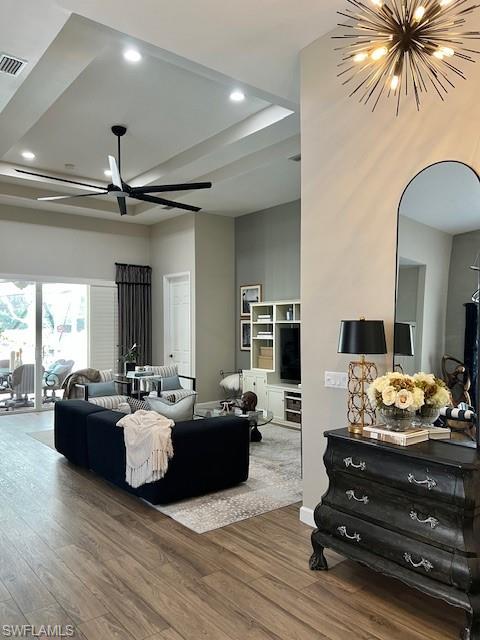 3411 Sandpiper Way Naples, FL 34109 - Photo 8 of 35 a living room with fireplace furniture and a wooden floor