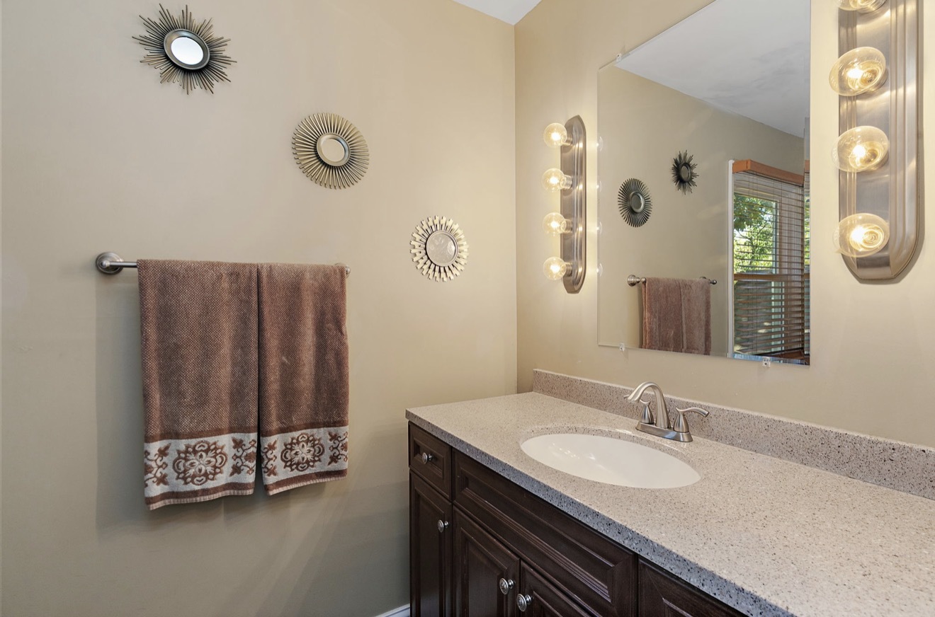11612 Becky Lee Huntley, IL 60142 - Photo 22 of 33 a bathroom with a sink vanity and mirror