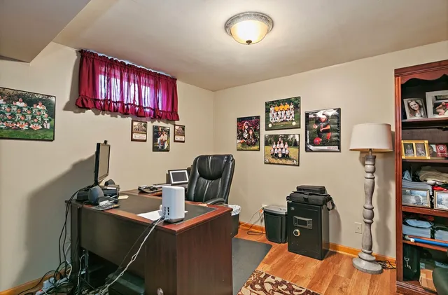 a view of a workspace with furniture