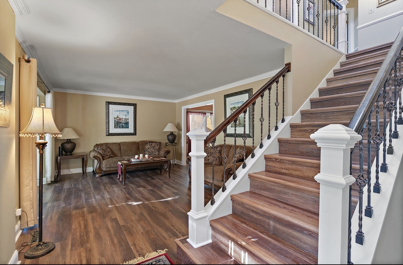 11612 Becky Lee Huntley, IL 60142 - Photo 3 of 33 a view of entryway and hall with wooden floor