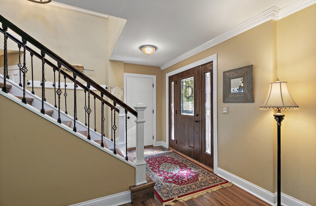 11612 Becky Lee Huntley, IL 60142 - Photo 4 of 33 a view of entryway and hall with wooden floor