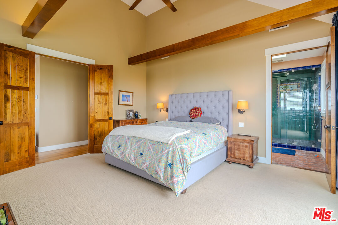 5903 Tellefson Road Culver City, CA 90230 - Photo 20 of 38 a bed sitting in a bedroom next to a window