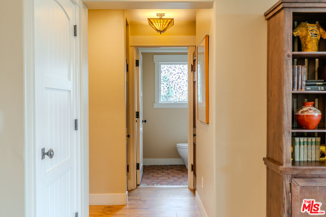 5903 Tellefson Road Culver City, CA 90230 - Photo 26 of 38 a view of a hallway with wooden floor and closet