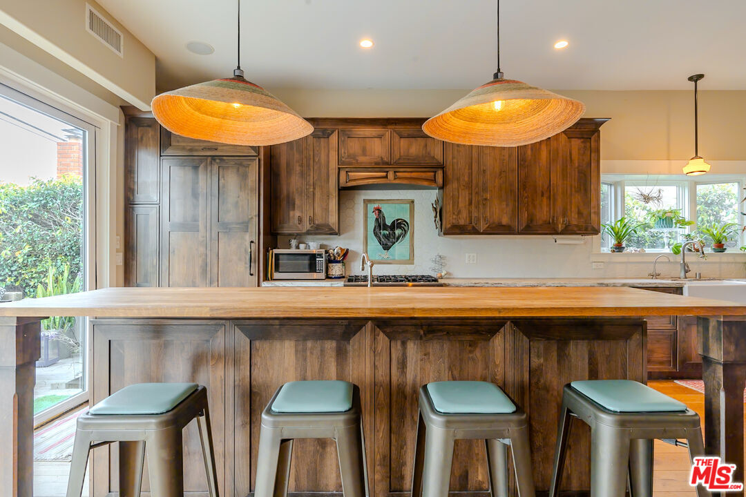 5903 Tellefson Road Culver City, CA 90230 - Photo 3 of 38 a kitchen with a sink and a large window