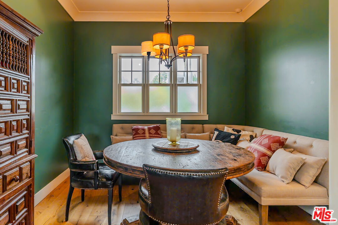 5903 Tellefson Road Culver City, CA 90230 - Photo 8 of 38 a dining room with furniture and a window
