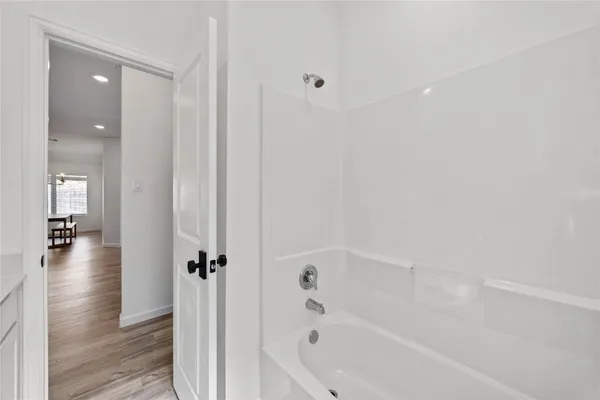 a bathroom with a bathtub