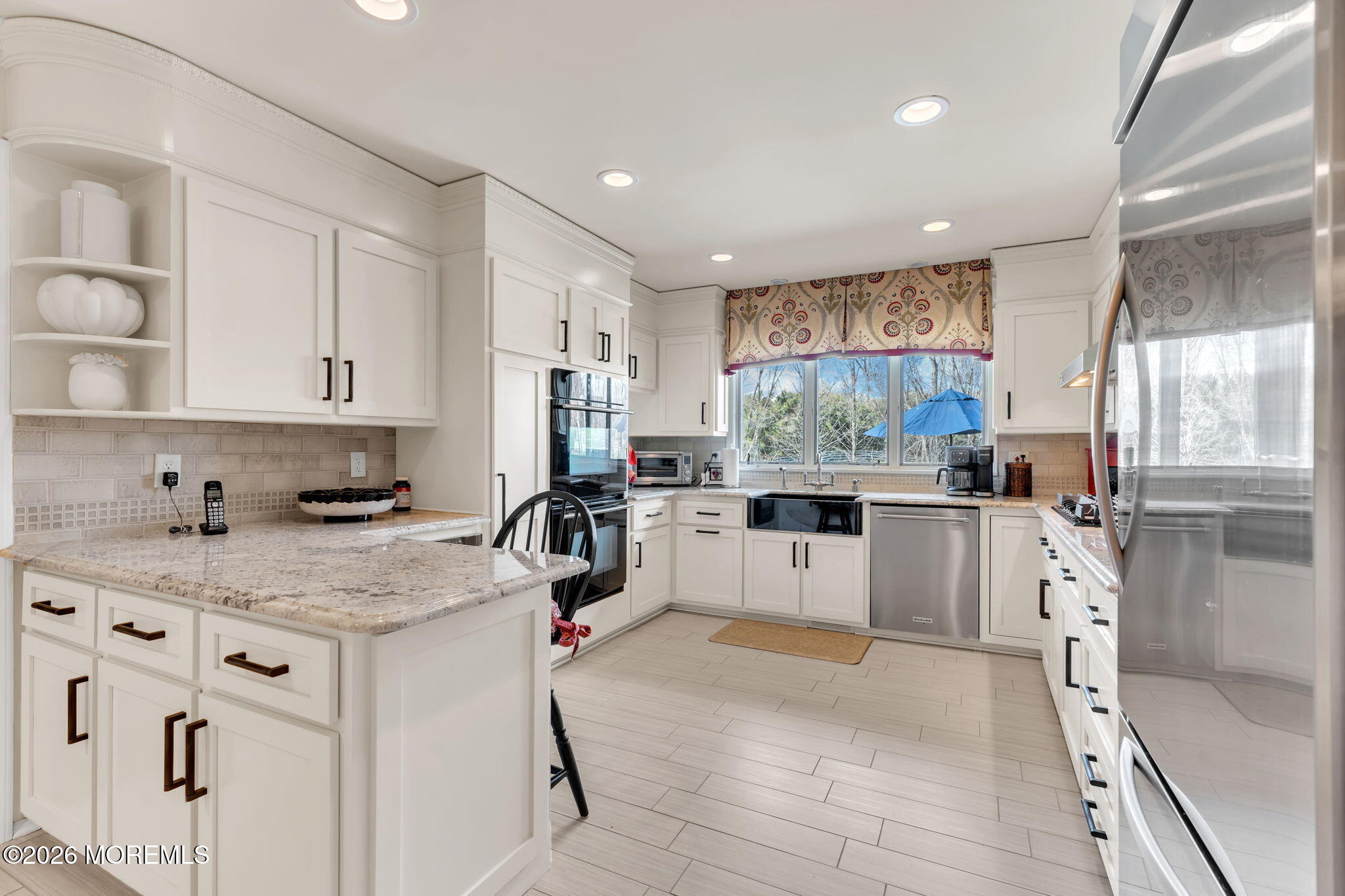 2 Alyce Lane Rumson, NJ 07760 - Photo 13 of 35 a kitchen with white cabinets and white appliances