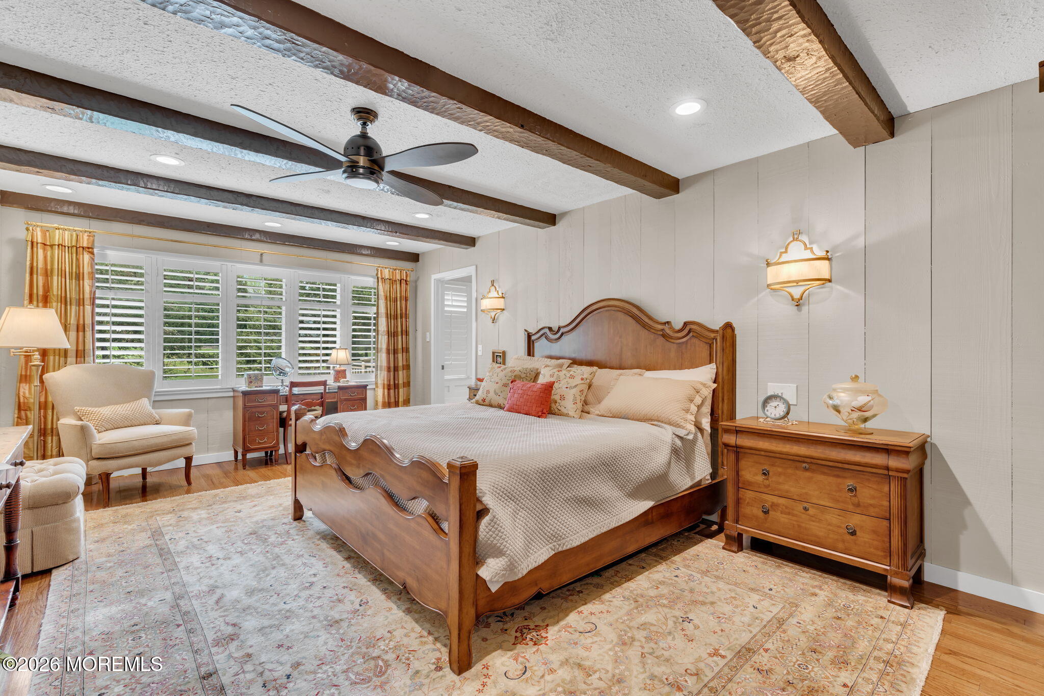 2 Alyce Lane Rumson, NJ 07760 - Photo 15 of 35 a bedroom with a bed and a chandelier