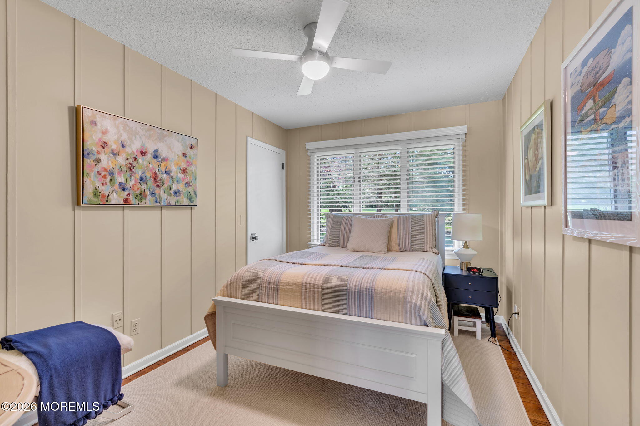 2 Alyce Lane Rumson, NJ 07760 - Photo 25 of 35 a bedroom with a bed and a painting on the wall