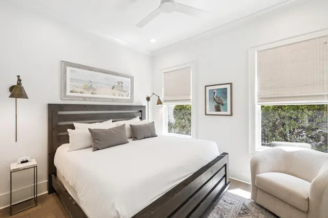 a bedroom with a bed and couch