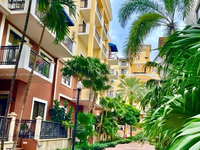 a view of a park with large trees
