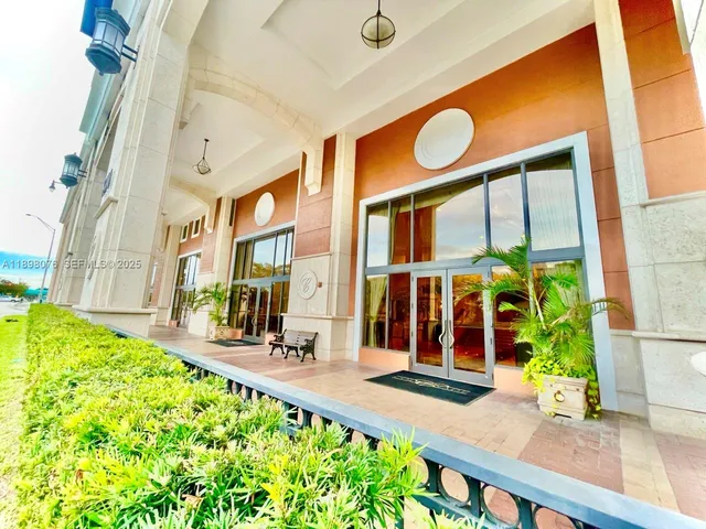 a swimming pool view with a outdoor seating