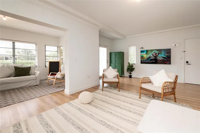 a living room with furniture and a couch