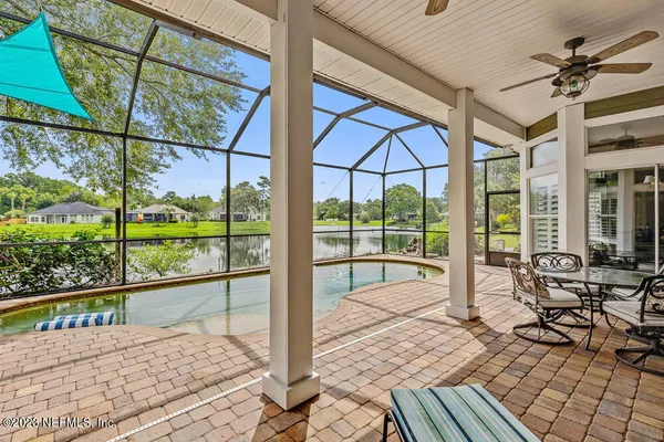 a view of indoor pool and sitting area