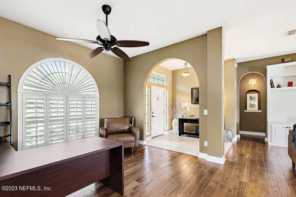 a view of a livingroom with furniture window