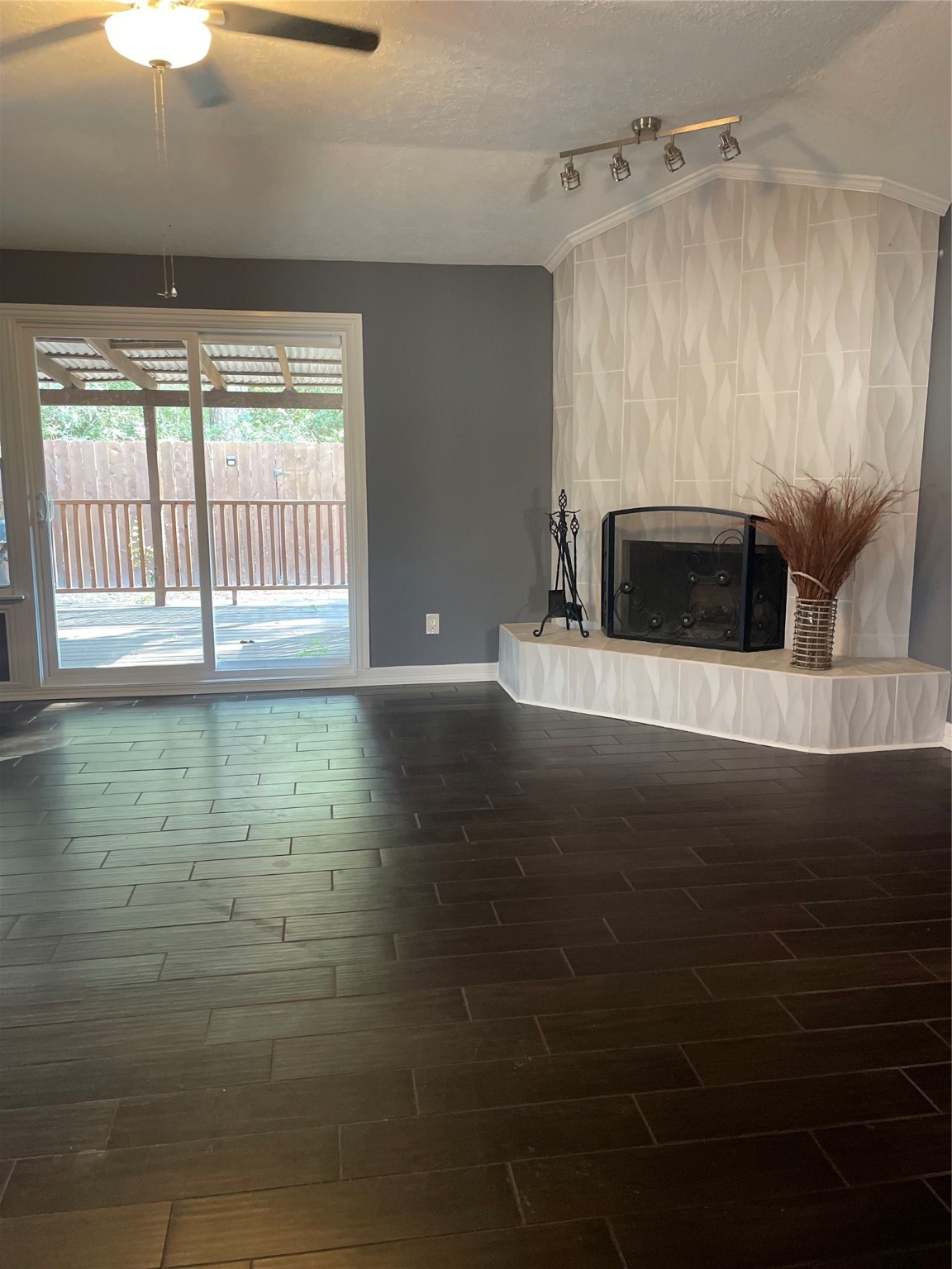 6510 Barrygate Drive Spring, TX 77373 - Photo 14 of 25 a view of an empty room with a fireplace and a window