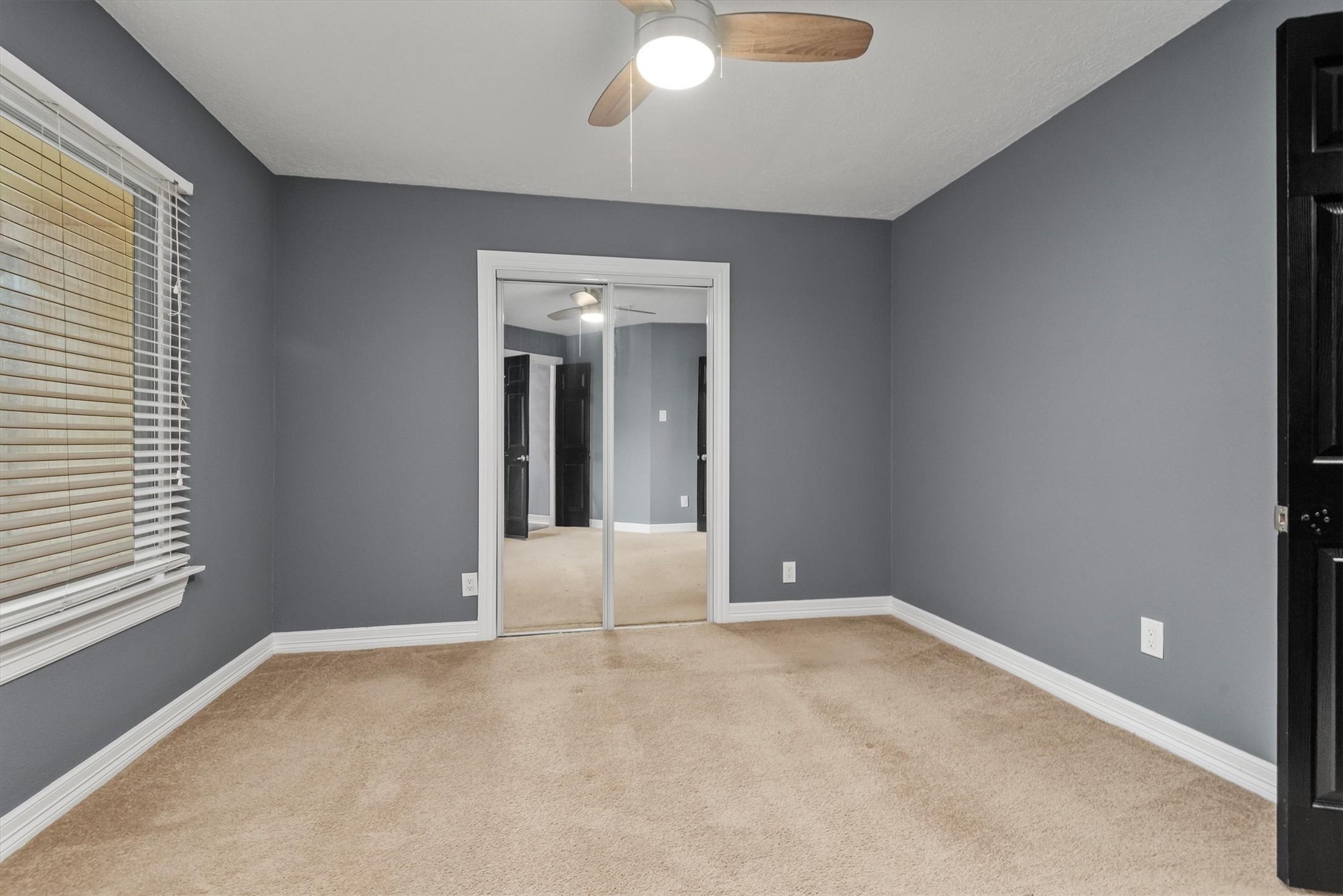 6510 Barrygate Drive Spring, TX 77373 - Photo 4 of 25 a view of an empty room with a window