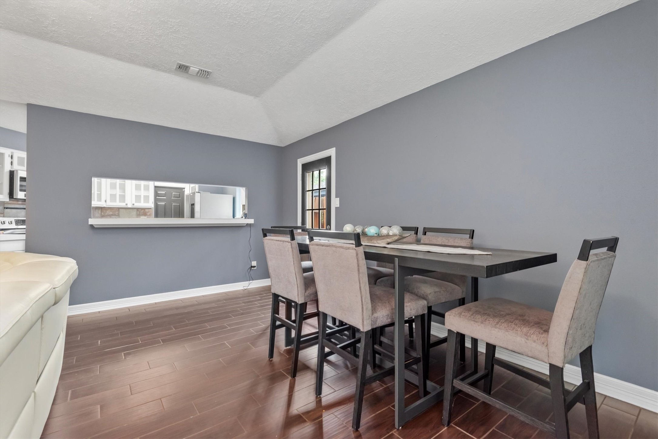 6510 Barrygate Drive Spring, TX 77373 - Photo 10 of 25 a view of a dining room with furniture and wooden floor