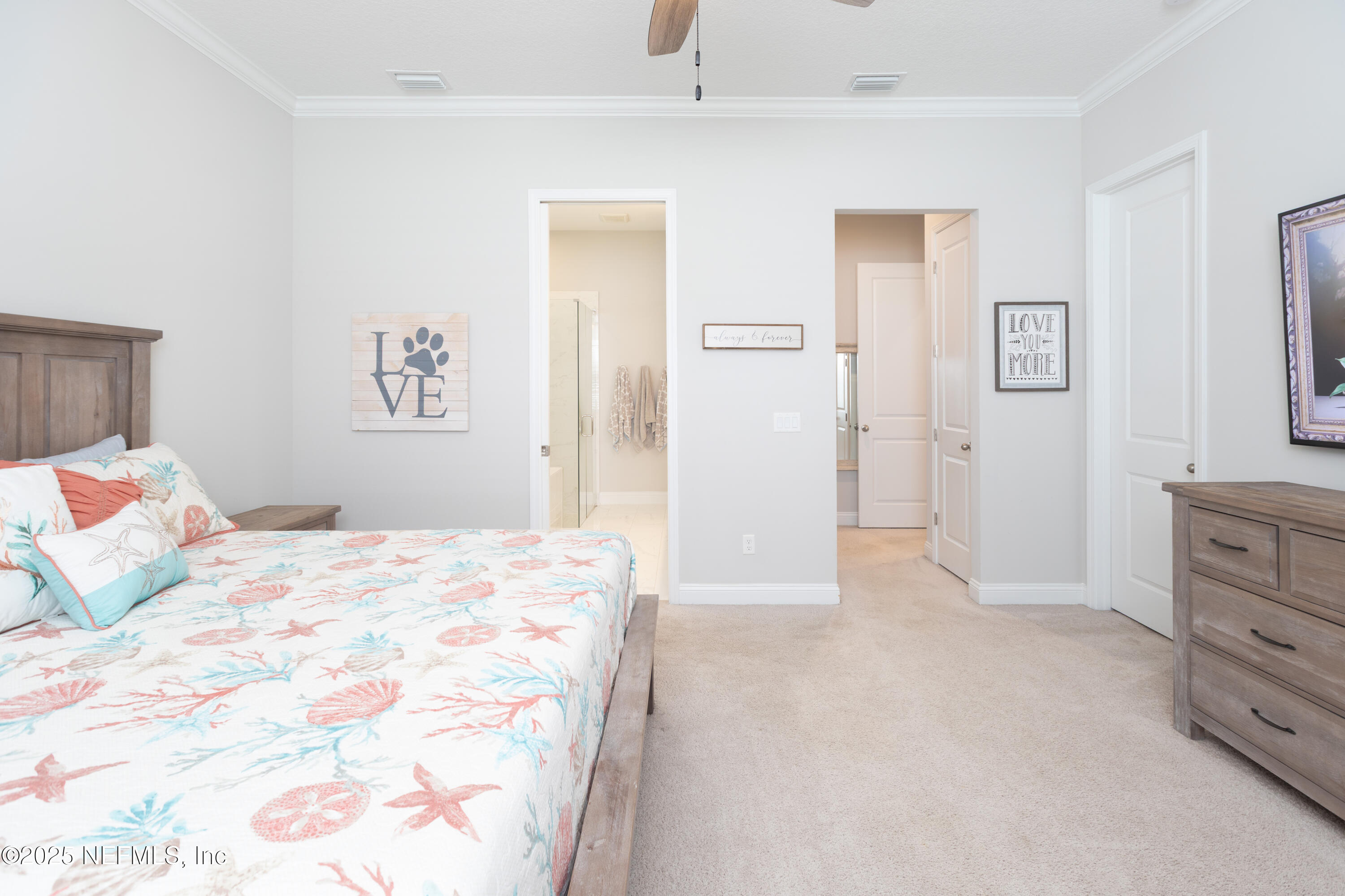 103 Tarbert Lane St. Augustine, FL 32092 - Photo 17 of 44 a bedroom with a bed and a dresser in it