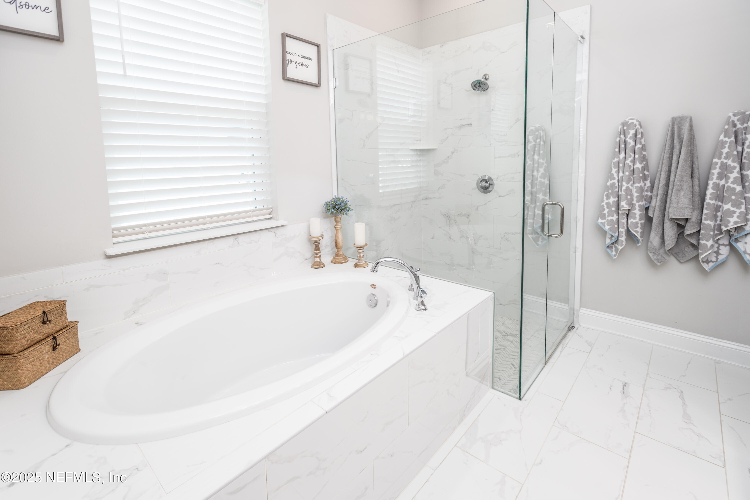 103 Tarbert Lane St. Augustine, FL 32092 - Photo 20 of 44 a white bath tub sitting next to a white sink