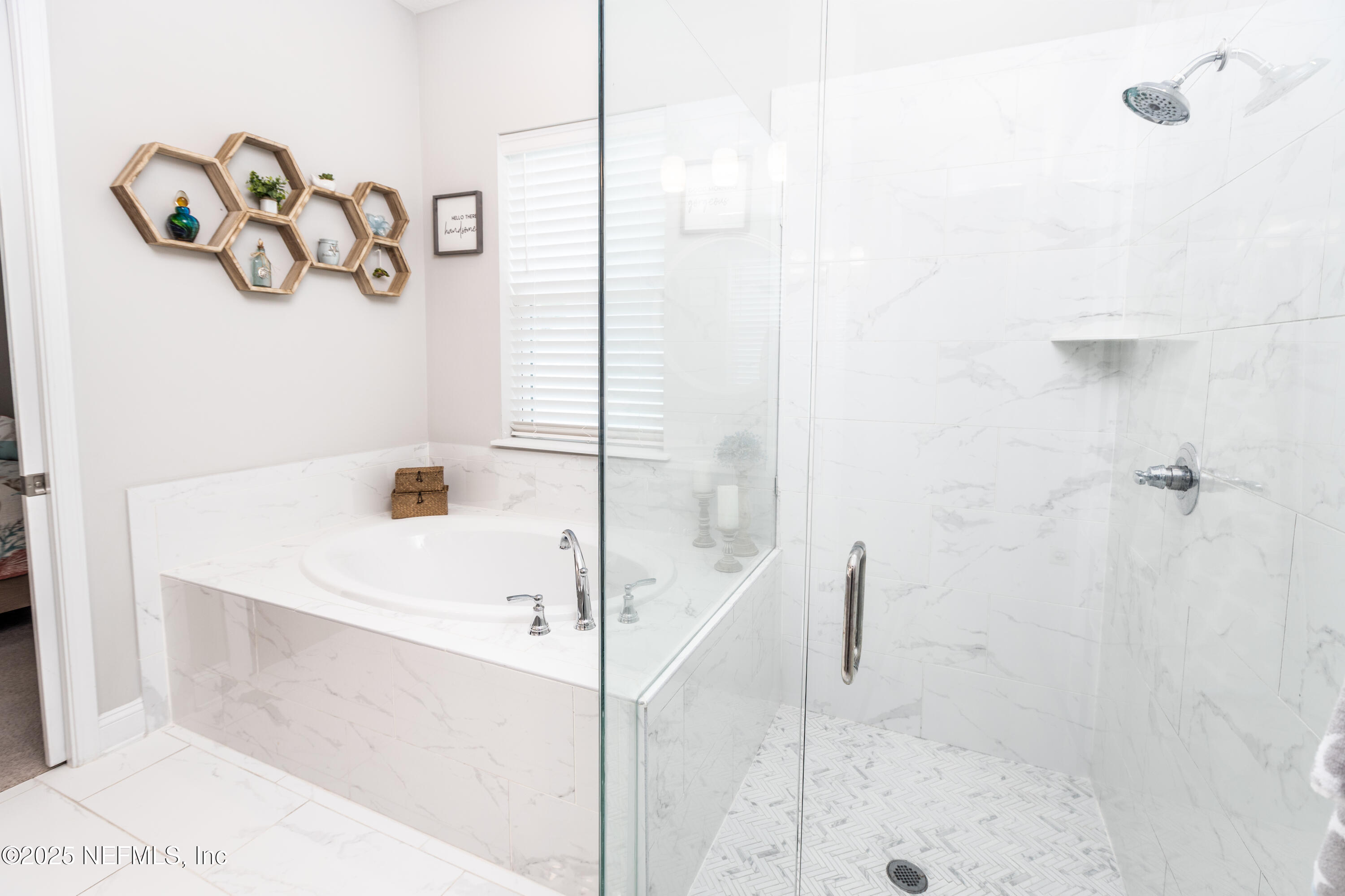 103 Tarbert Lane St. Augustine, FL 32092 - Photo 21 of 44 a bathroom with a bathtub and a shower