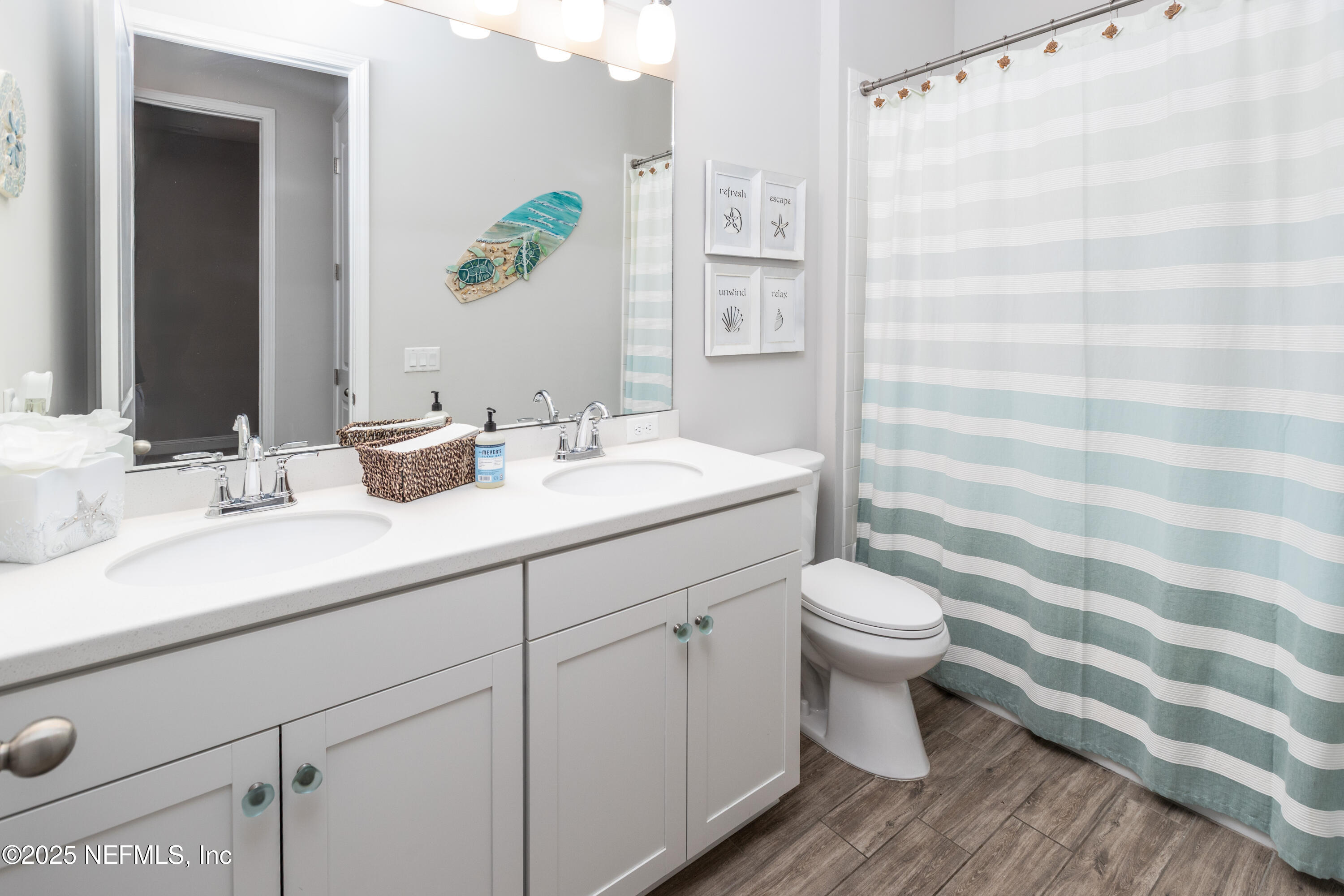 103 Tarbert Lane St. Augustine, FL 32092 - Photo 22 of 44 a bathroom with a sink and a mirror