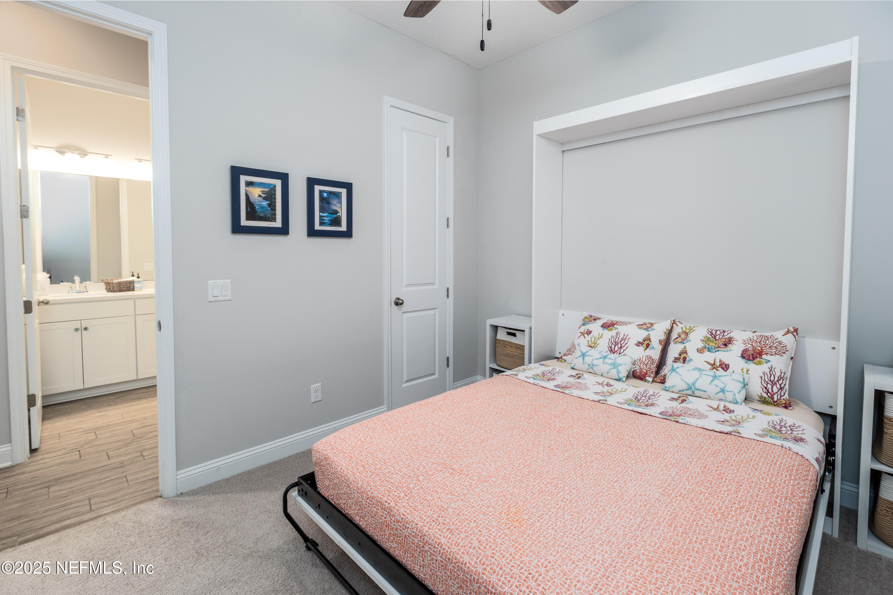 103 Tarbert Lane St. Augustine, FL 32092 - Photo 24 of 44 a bedroom with a bed and a view of kitchen