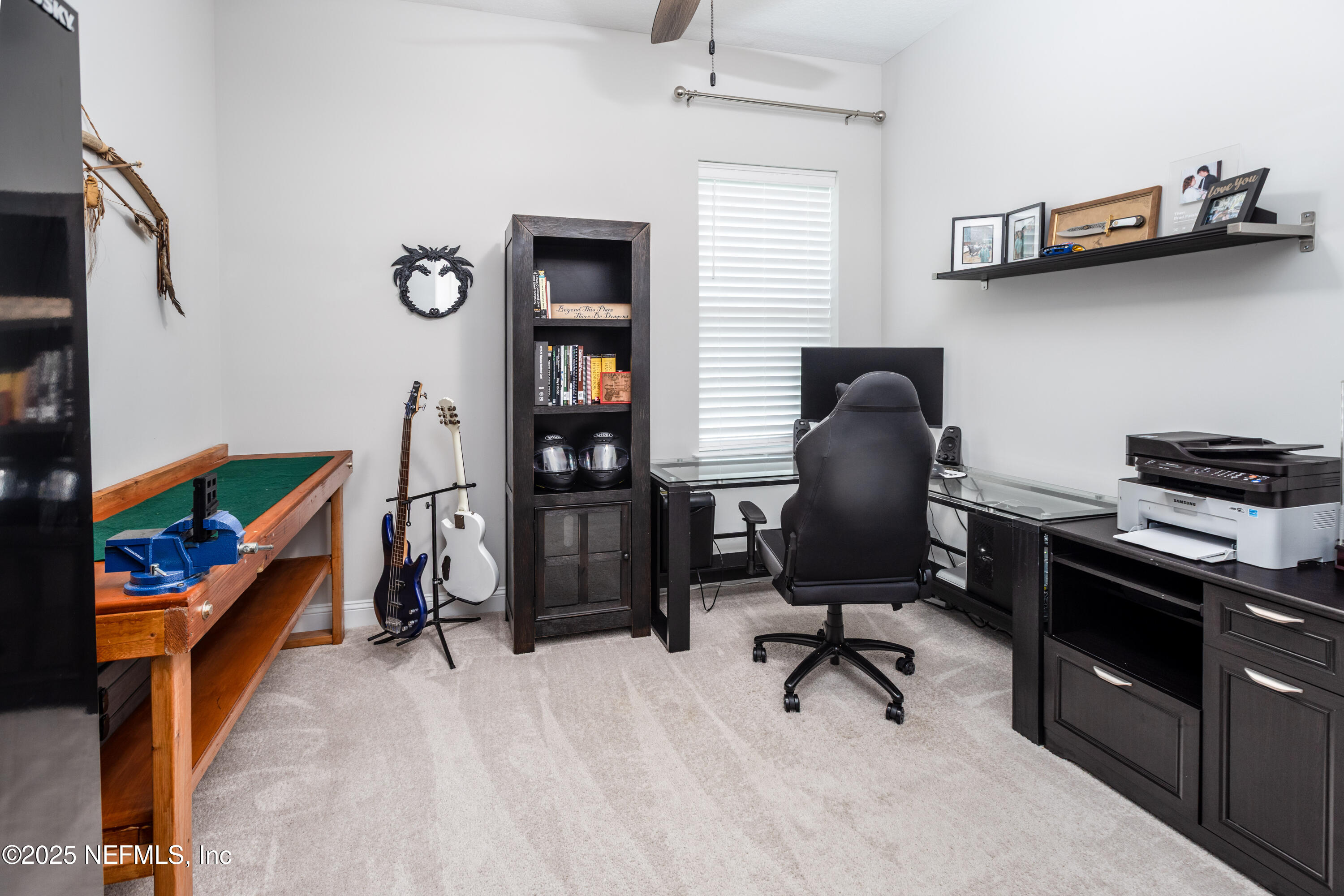 103 Tarbert Lane St. Augustine, FL 32092 - Photo 25 of 44 a view of a workspace with furniture and a window