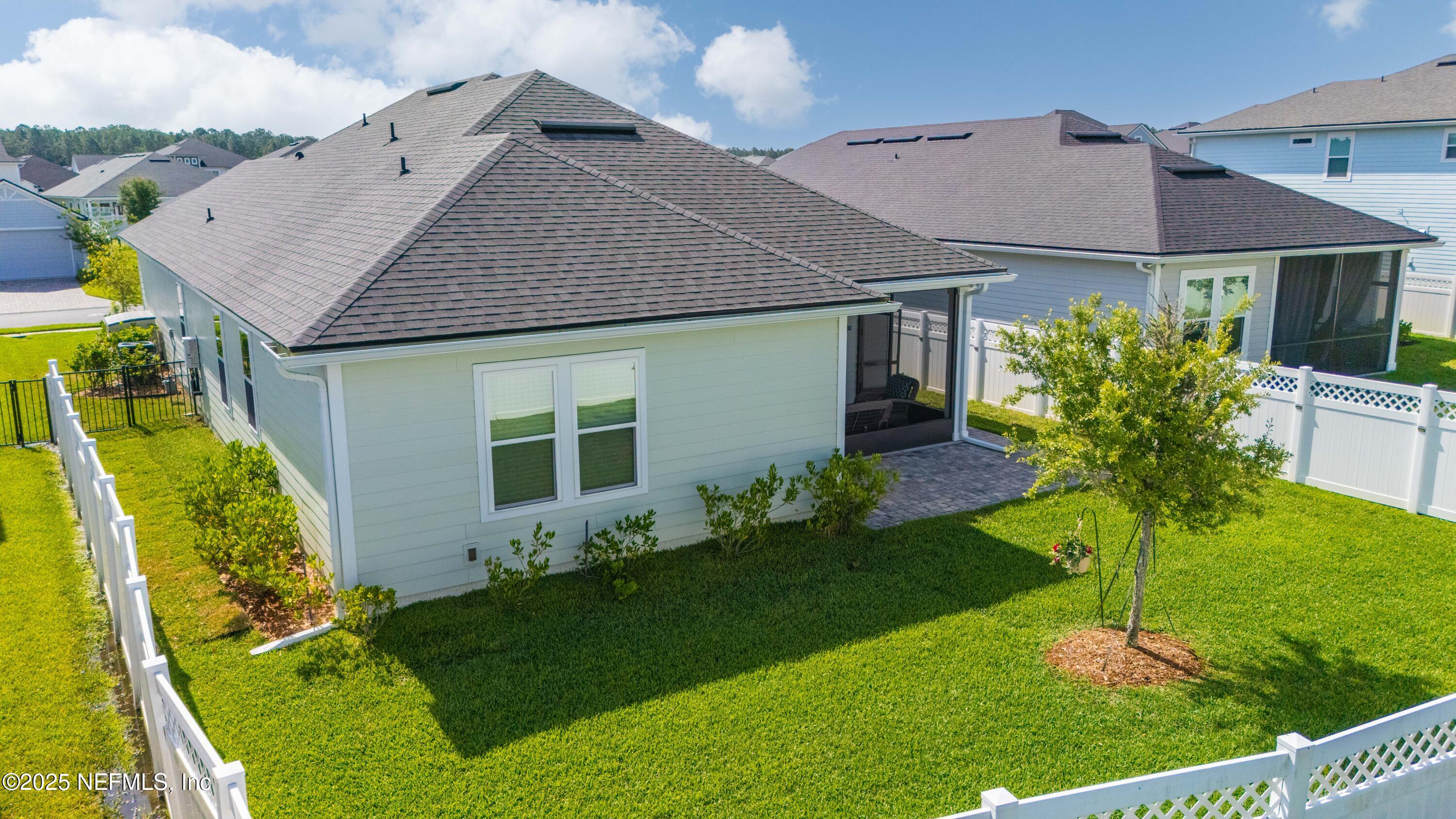 103 Tarbert Lane St. Augustine, FL 32092 - Photo 29 of 44 a front view of a house with garden