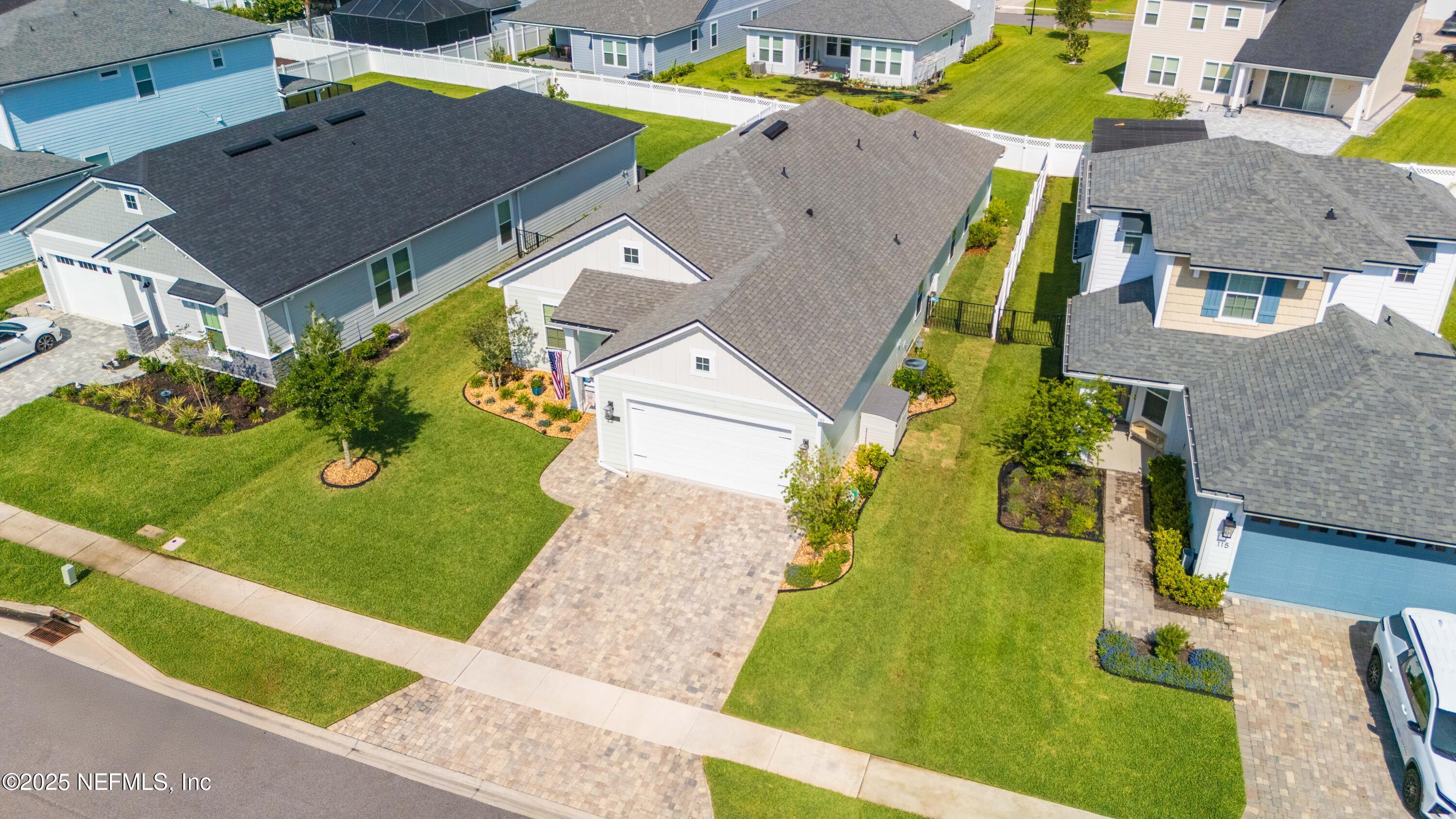 103 Tarbert Lane St. Augustine, FL 32092 - Photo 3 of 44 an aerial view of residential houses with outdoor space and swimming pool