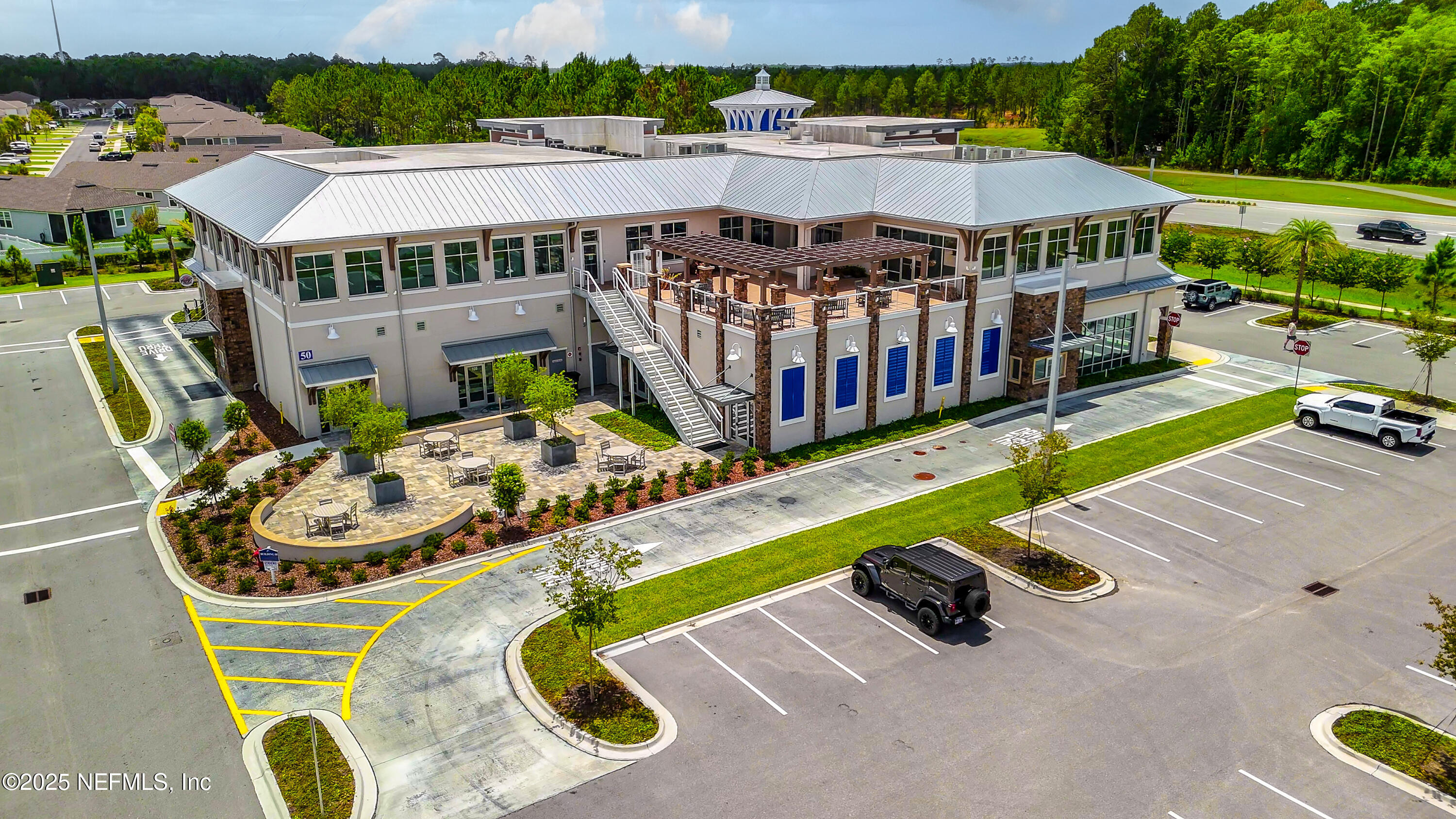 103 Tarbert Lane St. Augustine, FL 32092 - Photo 39 of 44 a view of a house with pool and chairs
