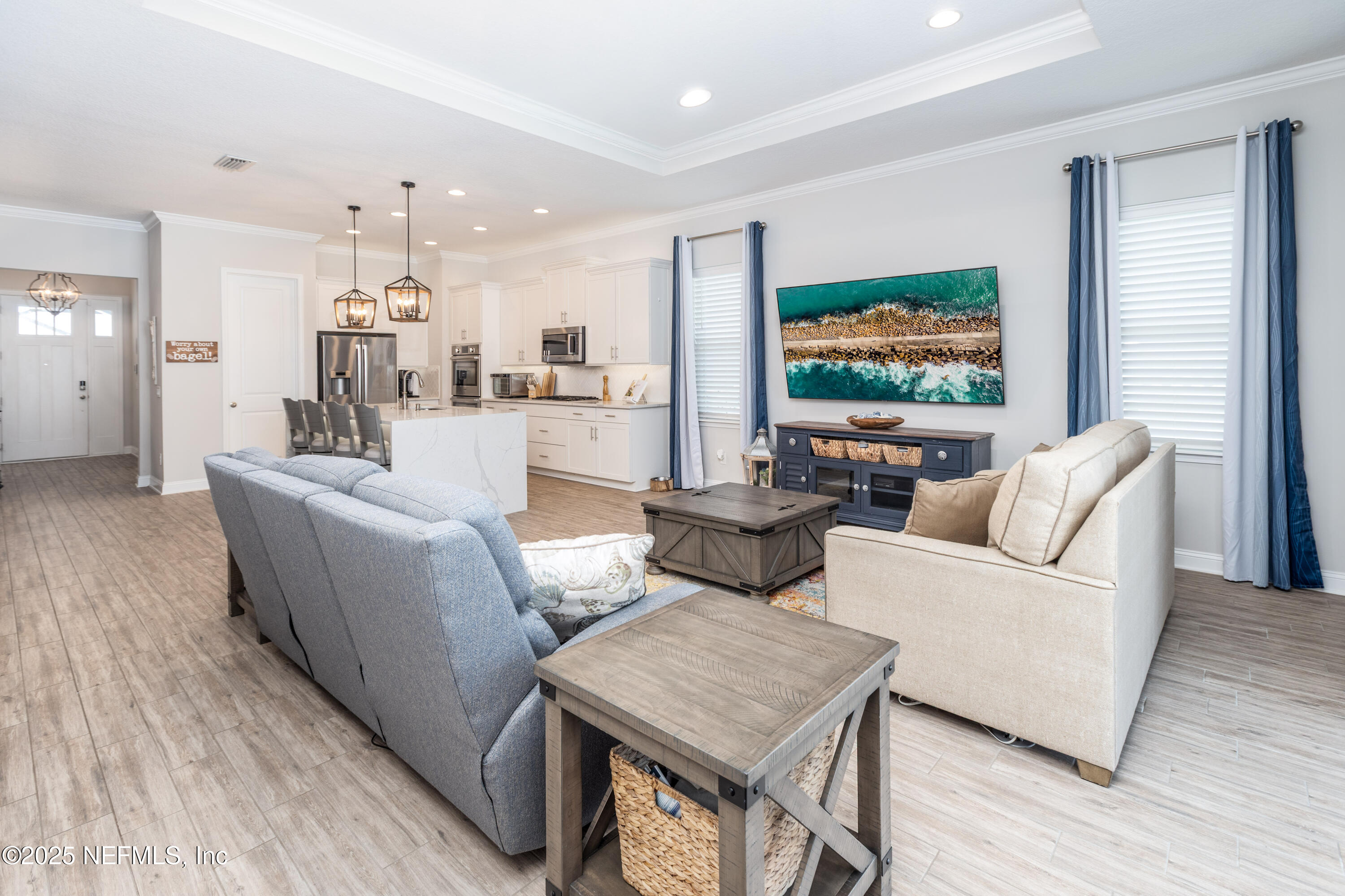 103 Tarbert Lane St. Augustine, FL 32092 - Photo 9 of 44 a living room with furniture and a flat screen tv