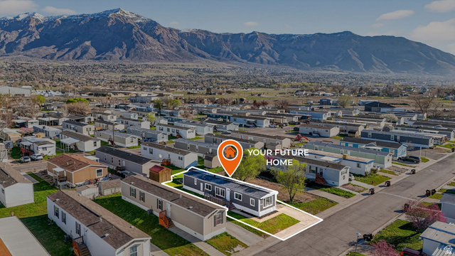 2491 Highway 89, Unit 523 Pleasant View, UT 84404 - Photo 24 of 31 Aerial view of residential area featuring mountains